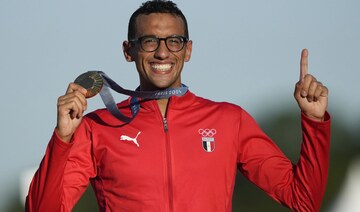 Ahmed Elgendy of Egypt becomes first athlete from Africa to win Olympic modern pentathlon gold. AP