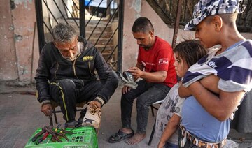 Besieged Gazans share shoes, wear same clothes for months