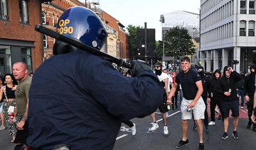 As rioters fill overcrowded prisons, UK turns to police cells