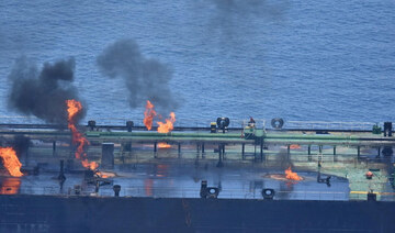 Flames and smoke rise from the Greek-flagged oil tanker Sounion, which has been on fire since August 23, on the Red Sea.