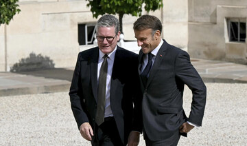 French President Emmanuel Macron receives Britain’s Prime Minister Keir Starmer before their meeting, Thursday, Aug. 29, 2024.