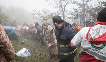 Rescue team works following a crash of a helicopter carrying Iran's President Ebrahim Raisi, in Varzaqan.