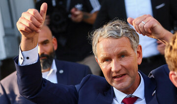 Right-wing Alternative for Germany (AfD) top candidate Bjoern Hoecke gives thumbs up on the day of the Thuringia state election 