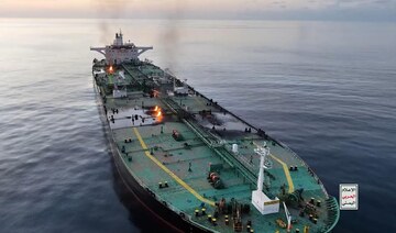 Yemen’s Houthis suspected of firing missiles at a container ship as an oil tanker burns