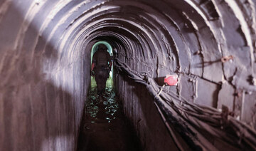 An Israeli soldier is seen inside a tunnel that the army claimed is a “Hamas command tunnel” in Gaza City. (File/AFP)