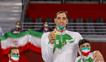 Iranian 2.46m para volleyballer struggles to find bed big enough