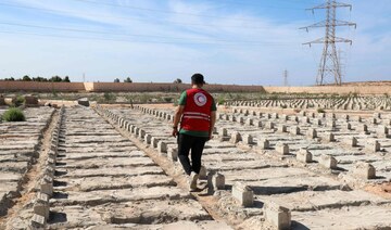 A Libyan city scarred by disaster tries to rebuild a year after deadly flooding