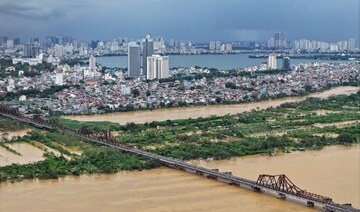 Hanoi river level hits 20-year high as typhoon toll passes 150