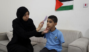 Gazan child amputee dreams big after evacuation to Qatar