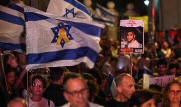 Supporters of Israelis held hostage by Palestinian militants in Gaza since October rally near the residence of the Israeli PM.