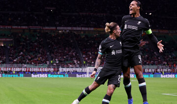 Stylish Liverpool strut past Milan in confident Champions league opener