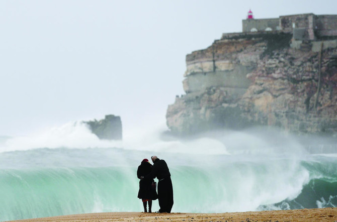 Portugal woman swept out to sea in religious ceremony