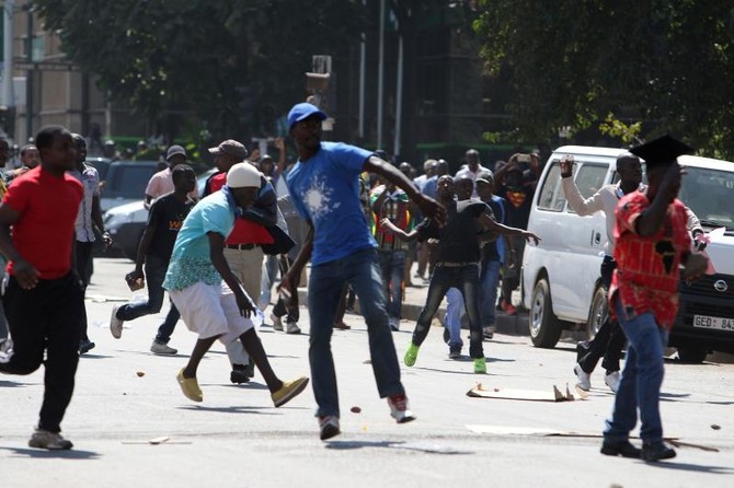 Police Break Up Anti Mugabe Protest Arab News 5366