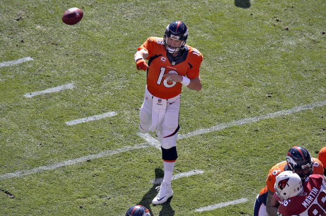 Manning sets milestone, Brady bounces back