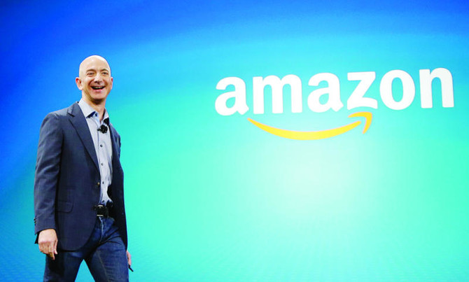 Amazon again delivers soaring sales but posts a huge loss