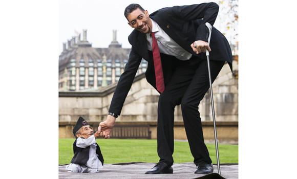 Chandra Bahadur Dangi, from Nepal, (L) the shortest adult to have ever ...