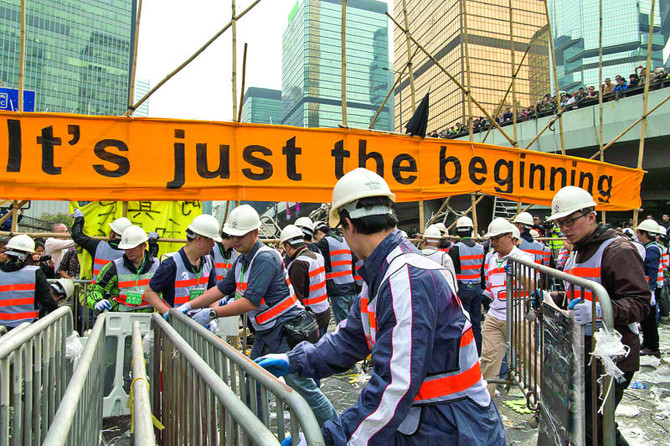 HK police haul away protesters from rally site