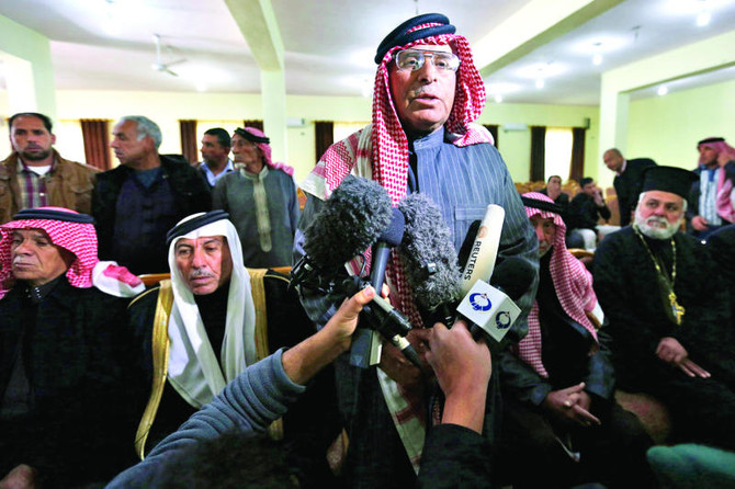 Father of captured Jordanian pilot asks IS to treat son well