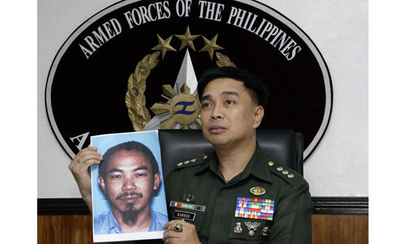 Is he dead? Philippines awaits answer of costly terror raid