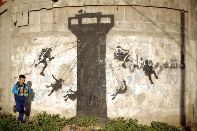 Banksy leaves his mark in Israel-leveled Gaza Strip