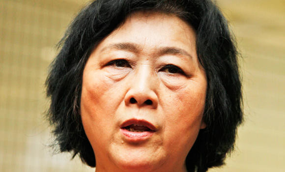 Beijing jails top journalist