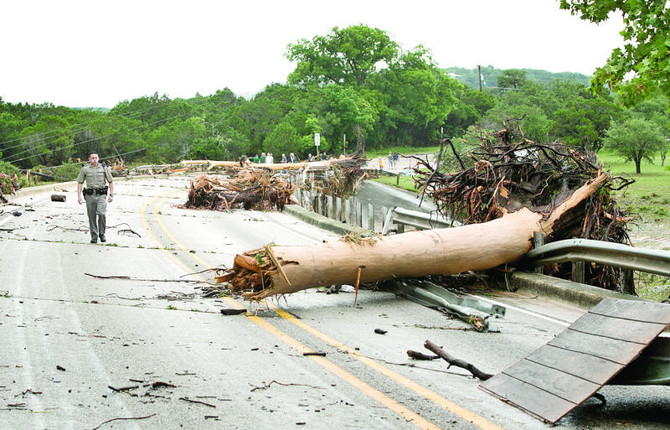 At least 3 dead, 12 missing in floods across central US