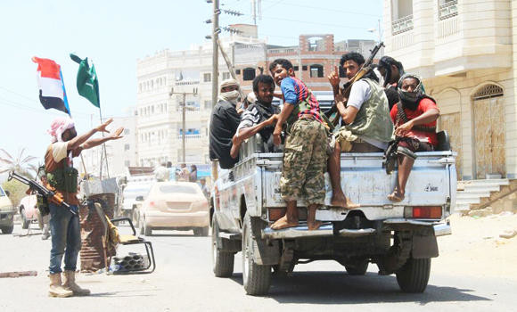 Fighters battle Houthis in Aden