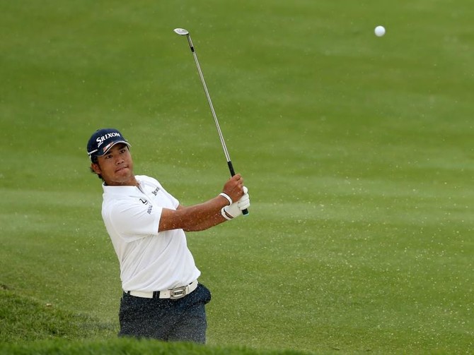 Matsuyama shares Memorial lead as Woods struggles