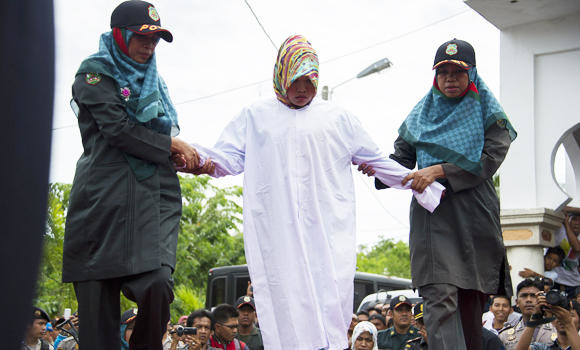 Unwed couples caned in Aceh province