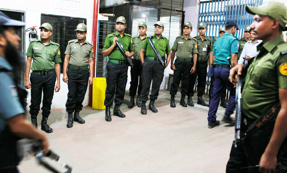 Bangladesh tells police to fire on radical attackers