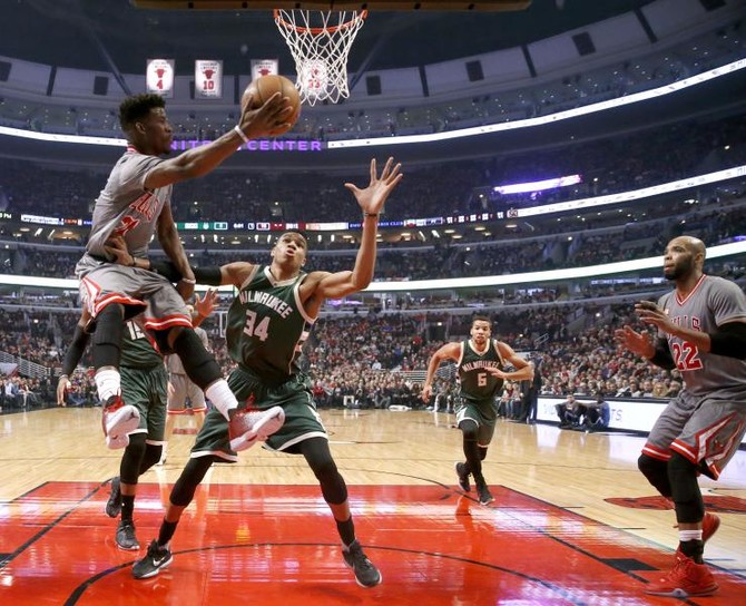 Butler's 32 points lead Bulls over Bucks 117-106