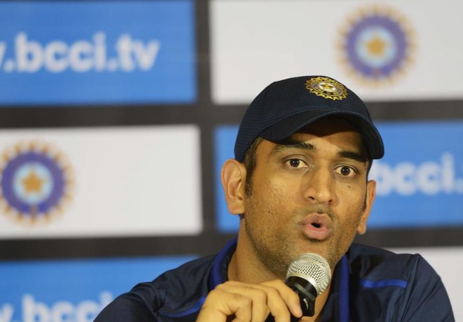 Dhoni questions earpiece use by umpires