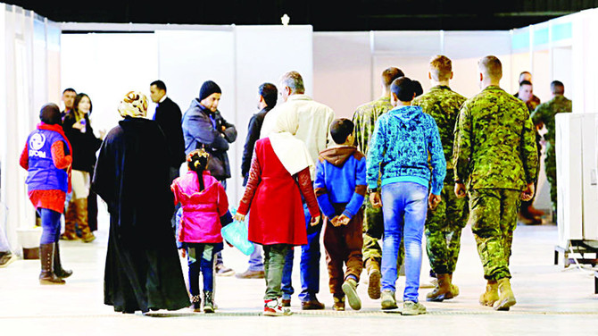 Canada seeks US cooperation over refugee influx