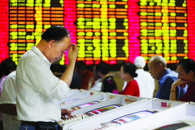 China issues first penalties involving HK stock link