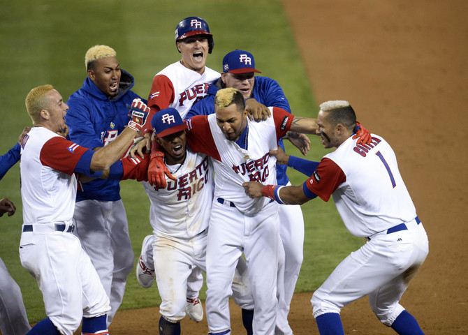 Eddie Rosario of Team Puerto Rico rounds the bases after hitting a News  Photo - Getty Images