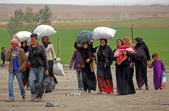 Syrians flee Raqqa ‘hell’ as US-backed assault nears