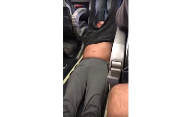 Video of passenger getting dragged off flight sparks uproar