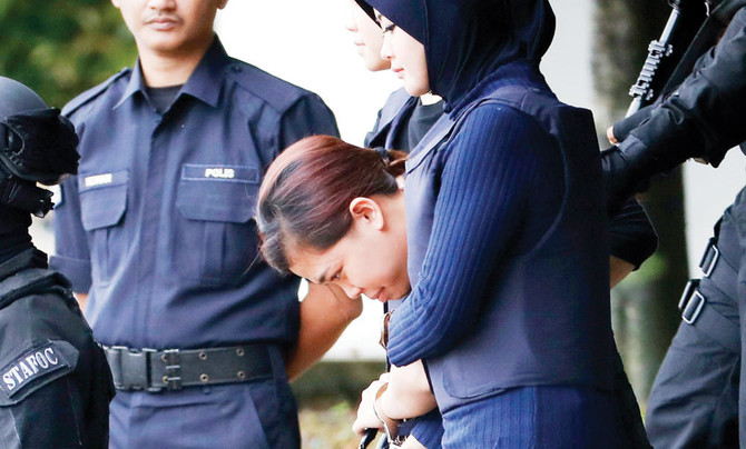 Kim murder suspects appear in Malaysian court