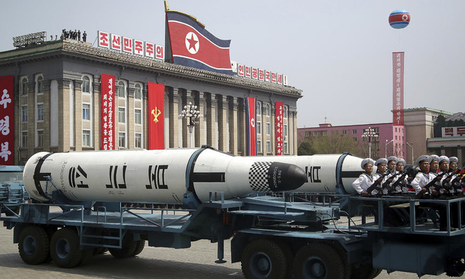 North Korea flaunts long-range missiles in massive parade