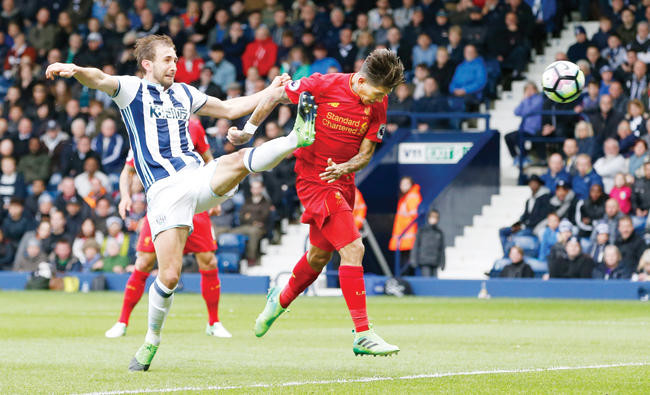 Firmino lifts Liverpool back to third place