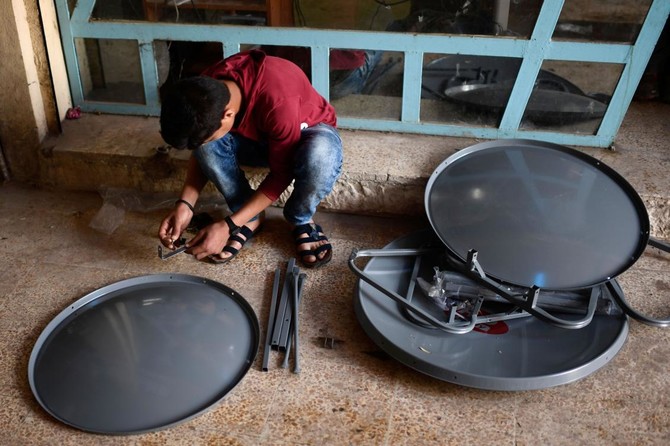 Satellite dishes reconnect post-Daesh Mosul to world