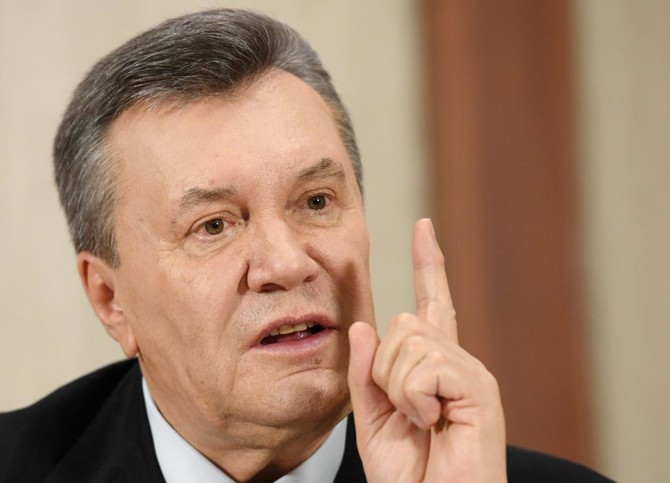 Ukraine lets Yanukovych testify by video in treason trial