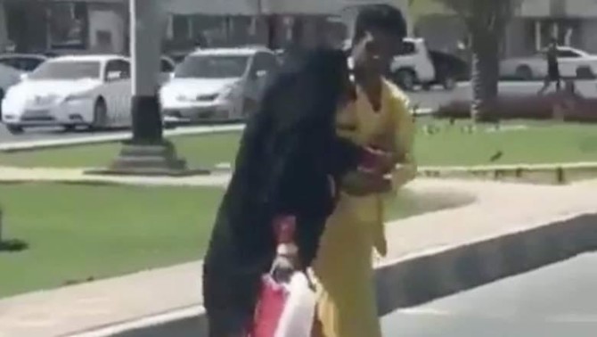 Watch: UAE street cleaner praised online for helping elderly lady