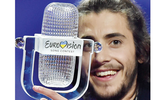 Portugal’s big-hearted crooner wins Eurovision