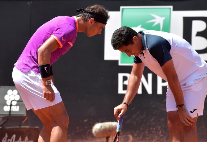 Nadal advances as Almagro quits with knee problem