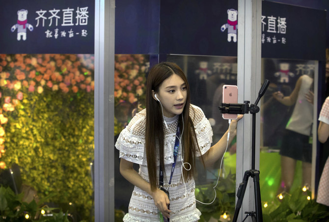 China shuts some live streaming sites, punishes companies