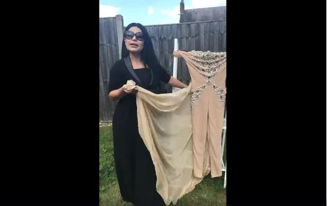 Afghan singer burns dress in viral video after uproar at home