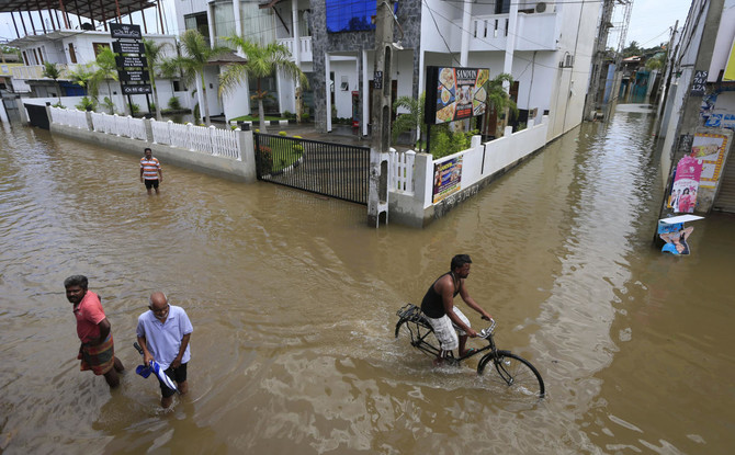 Sri Lanka races to rescue flood victims before rain resumes