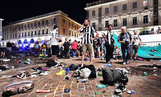 Hundreds of Juventus fans injured in stampede in Turin