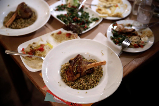 In the kitchen, “we’re all human“: Refugee cooks up taste of Syria in Athens